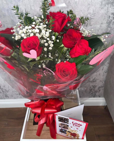 6 Red Roses - 6 Red roses finished with fresh greenery for a beautifully romantic look.